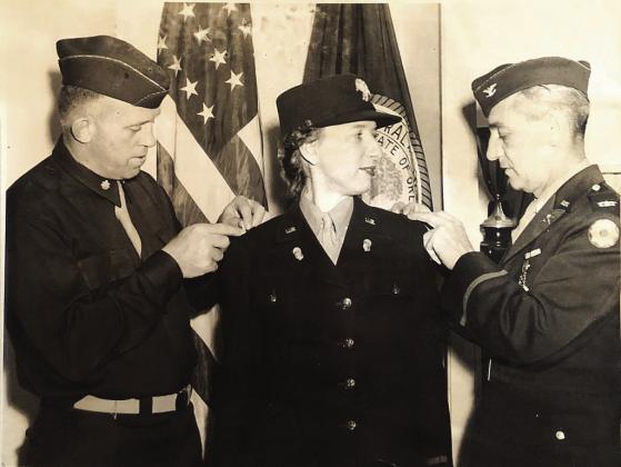 Helen Freudenberge Holmes being promoted in 1942.