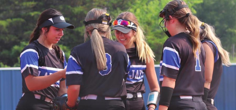 Guthrie Softball team huddle