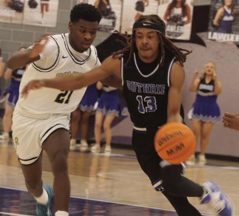 Braydon Morgan drives around Midwest City’s Bryan Williams.