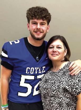 Xavier Noble with his Mom.