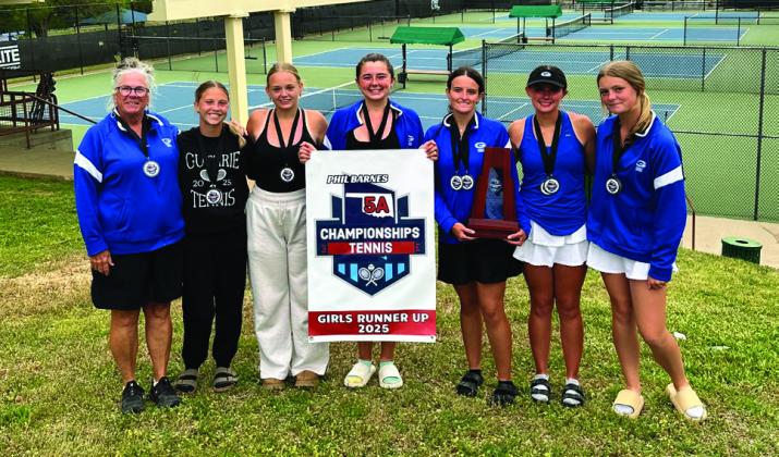 Left to right: Coach Mary Hudson, Lola Brown, Kenzie Hardesty, Rylee Tobin, Apen Mitchell, Hollie Mitchell and Haven Hudson. Courtesy of Mary Hudson. Photo by George McCormick