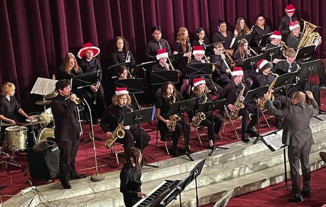 Pictured Above, The Guthrie Public Schools bands were on full display on December 8 for their annual Christmas concerts at the Scottish Rite Masonic Temple. The Guthrie High School Concert Band and GHS Jazz Band are pictured. The Guthrie Junior High School Band and various ensembles entertained friends and family who filled the auditorium up to capacity. Photos curtesy of Sandy Stout
