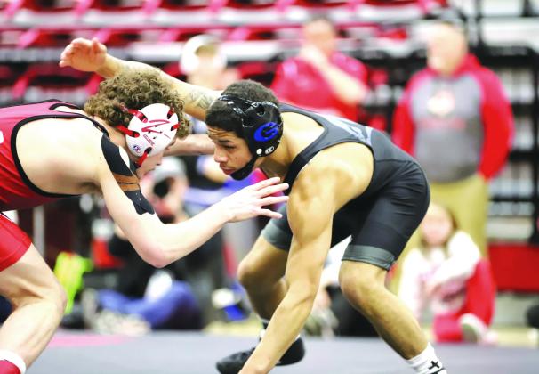 Guthrie's Kaedin Herendeen wrestles against Claremore's Mason Gillespie in the 5A East Regional championship on Saturday, Feb. 22. Courtesy of Guthrie Wrestling (Facebook).
