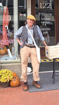 The Guthrie News Leader’s own newsie, Bobbi Waddell, was ready to hand out candy — and breaking news — during Guthrie’s downtown trick-or-treating event.