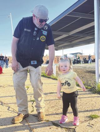 Levi Chamberlain with daughter Avery Rose Chamberlain enjoying some live music.