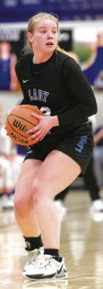 Kynlee Smedley looking to pass the ball.