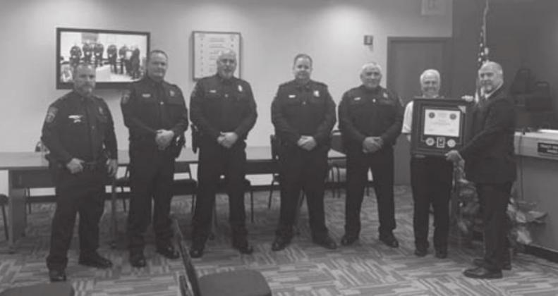 Guthrie Police Department receiving award at City Council meeting.