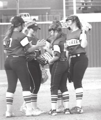 GHS slow pitch huddle.