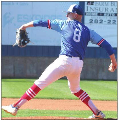 Josh Rains delivers a pitch. Photo by Mike Monahan