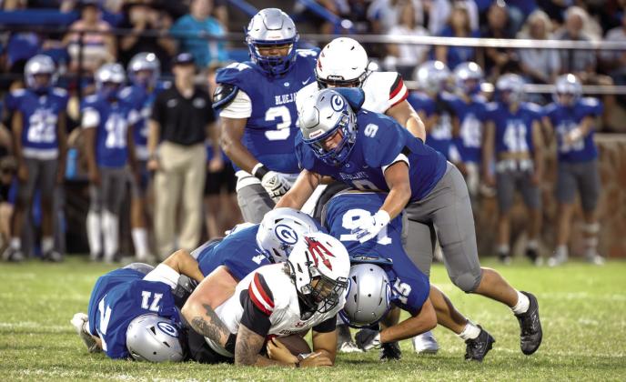 Guthrie defender Gamble Smith tackles a Duncan ball carrier during the Bluejays' 42-10 win Sept. 12.