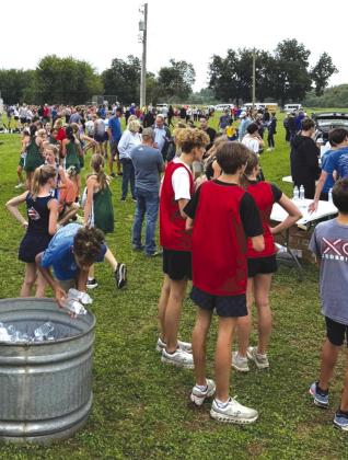 Competitors gather between races at the Clay Tarter Invitational at Guthrie’s Cottonwood Flats. Submitted photo.