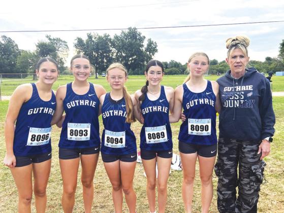 Varsity Girls- Taylor Schroder (won girls 5K), Addie Poupard, Laina Richardson, Jaydin Alexander, Kylee Canary, Coach Lisa Reece. Photo by Bobbi Waddell.