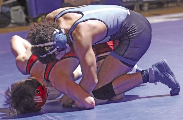 GHS Kaedin Herendeen at 106 pounds on way to 7-1 win over Duncan's Jack Ensey on January 3.