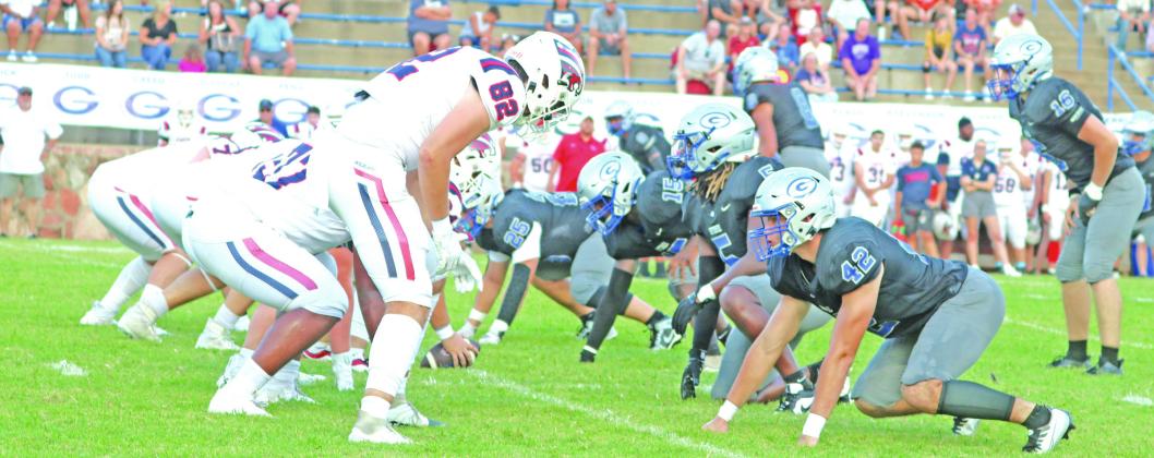 Guthrie defense lines up for first play of the game. Photos by Mike Monahan
