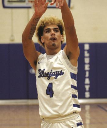 Guthrie's Kolton Carlock shoots a free throw during Friday_s game versus Claremore, Friday, Jan. 31. Photo by George McCormick.