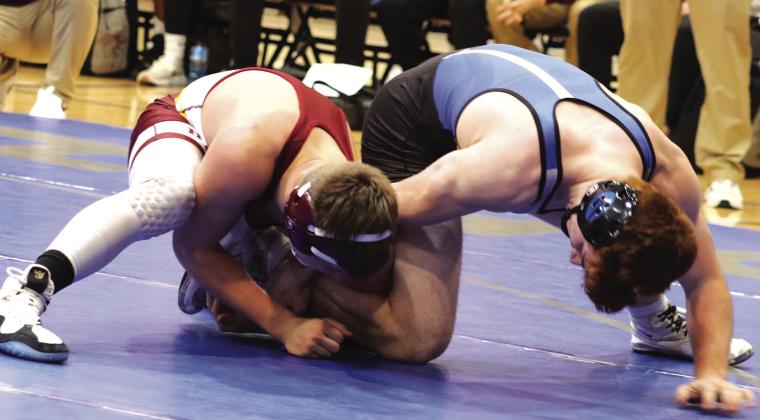 Bryson Hall in action against Blackwell’s Lawson Lusk on January 11.