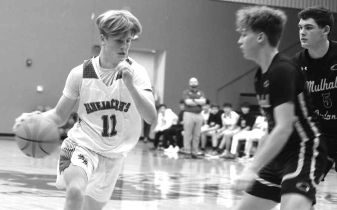Coyle’s Conner Moorman looks to get by Panthers defense on Jan. _