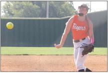 Crescent Coach Steve Hudson discusses issue with pitcher. Crescent pitcher.