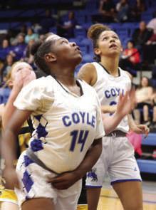 Coyle’s Sierra Young and Naliyah McLaurin look for rebound.