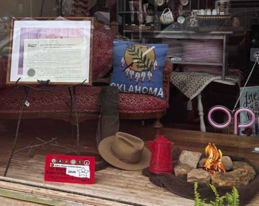 Angela Hurst of Dalia Home Boutique, 122 W. Oklahoma Ave., won the 89er window contest with a display featuring her family’s historic land grant and heirloom farm gear.