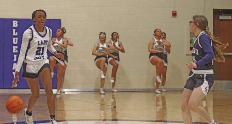 Ania Morgan brings ball up the court against El Reno.