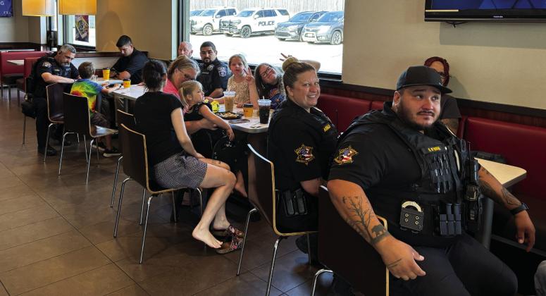 Pictured Above, Local Guthrie police officers and Logan County Sheriff’s deputies were at the local McDonalds last week for a meet and greet with customers. The event was held so that local residents could visit with the local law enforcement personnel in a neutral setting and ask questions. Photo by Trey Dallas