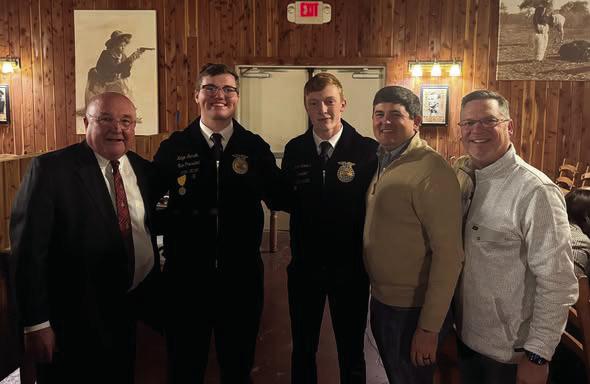 Dr. Mike Simpson, Representative John Pfeiffer and Senator Chuck Hall with Guthrie FFA students, Ridge Garrett and Colton Stevens. Photo submitted