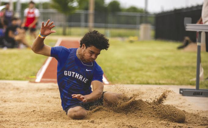 Guthrie’s Codie Carlock competes in the Class 5A long jump during the OSSAA State Track and Field Championships at Western Heights on May 15. Carlock placed sixth with a jump of 21 feet, 1.75 inches. Photo by Brent Fuchs