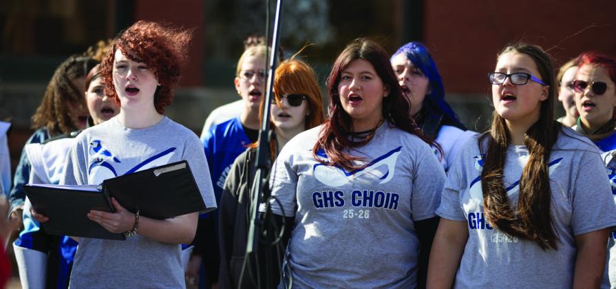 Guthrie High School choir students perform during a Veterans Day ceremony at Honor Park in Guthrie on Nov. 11, 2025.