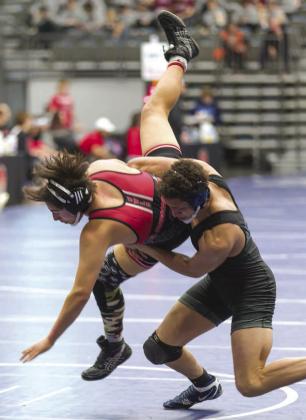 Tyler Gettings against George Tahdooahnippah. Photo by Brent Fuchs.