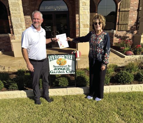 Jed Waggoner, President of F&amp;M Bank Guthrie Market, and Jennie Woodard, Jonquil Garden Club Representative. Submitted photo