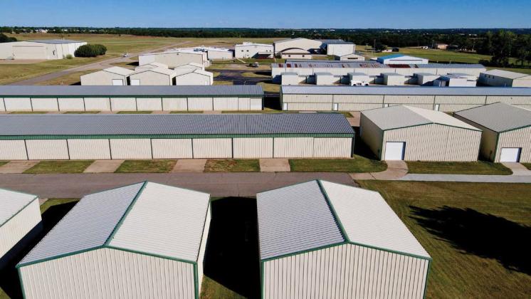 A row of hangars houses a portion of the more than 130 aircraft based at Guthrie-Edmond Regional Airport.