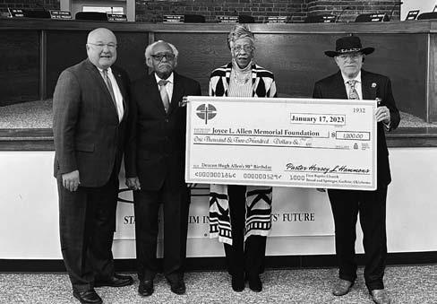 Pictured are Guthrie Public School Superintendent Dr. Mike Simpson, Hugh Allen, Joyce Lyons, and First Baptist Church Pastor Hersey Hammons.