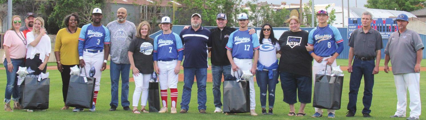 Pictured L-R, Guthrie baseball seniors Kia Codding with her parents Sonya and Ryan Codding; Jaylen Allison with parents Lamont and Rochelle Allison; Ty Biggs with parents Scott and Kim Biggs; Peyton Miller with parents Jeremy and Stephanie Miller; Josh Rains with parents Tonyua and John Rains; and Head Baseball Coach Casey Porter Photo by Mike Mohahan
