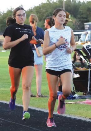 GHS Sophomore Taylor Schroder leads the way at Guthrie Mile Night.