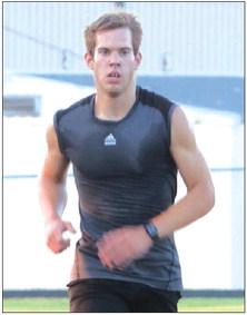 GHS Isaiah Blevins wins the boys Guthrie mile.