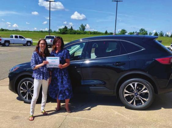 Guthrie Teacher of the Year Kat Jensen claims her summer car at John Vance Auto Group. (Photo provided)