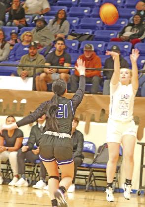 Guthrie’s Anjewl Murillo leads fast break to basket. Guthrie’s Kynlee Smedley soots one of here three-point shots Friday night as Noble’s Landry George closes in.