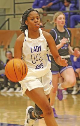 Guthrie’s Mariah Dightman drives to basket on way to 25 points.