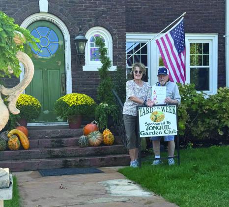 Jonquil Garden Club is proud to announce Yard of the Week to Ken and Terri McBroom at 903 East Harrison. Pictured is Jennie Woodard, Jonquil Garden Club and Ken McBroom. Submitted photo