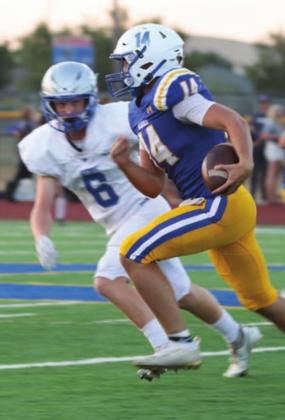 Jackson Walters gets after Piedmont quarterback