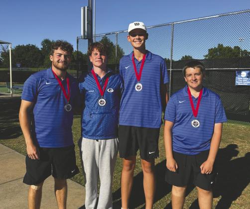 The Guthrie boys tennis team gathers after competing at the Class 5A State Championships, highlighted by a second-place finish from Carson Olmsted and Jaxson Mayer in No. 1 doubles and a fifth-place finish from Drake Shelton and Trenton Edberg in No. 2 doubles. Photo Submitted