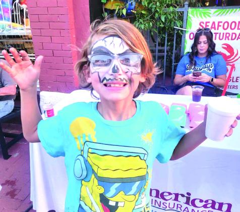 Children enjoyed face painting, inflatables, food and live music during this year’s Guthrie homecoming block party. Submitted photo
