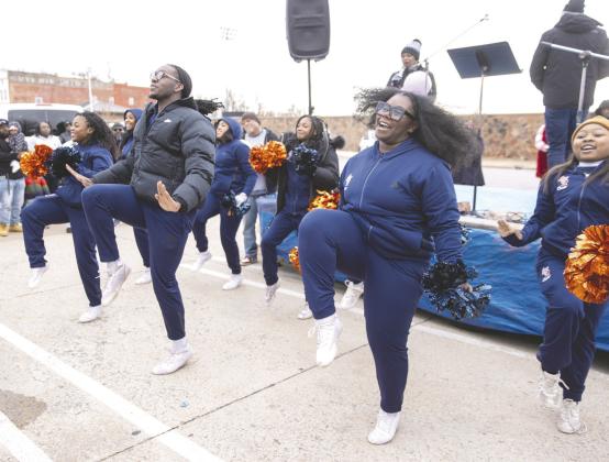 Langston University cheerleaders entertain the attendees of the annual Martin Luther King Jr. parade on Jan. 19 in Guthrie. Photo by Brent Fuchs