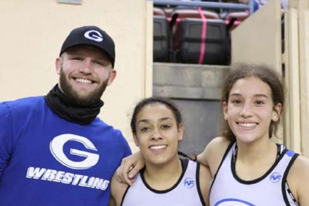 Coach Davenport with the Kirk girls after the semis.