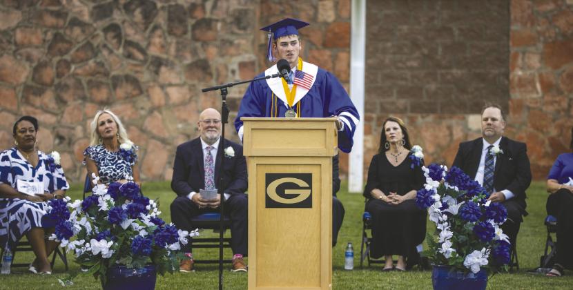 Valedictorian Silas Walsworth speaks to the Class of 2026 during Friday evening’s graduation ceremony at Guthrie High School. Photo by Brent Fuchs.
