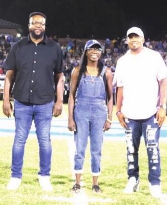 Pictured (L-R); The newest members of the Guthrie High School Sports Hall of Fame that were introduced to the halftime crowd Friday night. David Washington, Honey Nicole Monroe Morton, and Keaton Callins. Washington graduated in 2004 and was part of the 2002 state football championship team. He participated in football, basketball and track and would go on to play for the Oklahoma State Cowboys from 2005-2008. Morton graduated in 1996 and was a three time allstater in cross country and track. She was a 400
