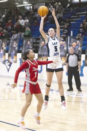 Guthrie’s Lily Rechlin shoots over a Carl Albert defender in a home game played Feb.6. The Titans won 82-25. Photos by Brett Fuchs