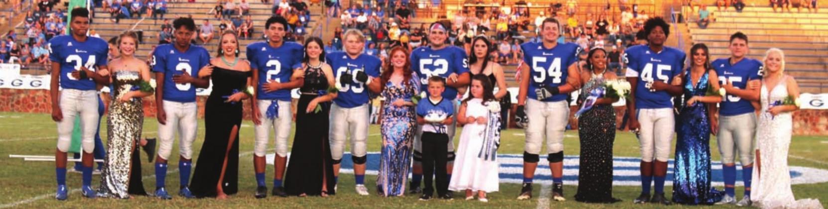 The 2021 Homecoming Royalty at Jelsma Stadium Oct. 8, 2021 after the queen announcement. On the back row (L-R) is Kyran Axtell with freshman Attendant Mollie Throckmorton; Kyrin Eaton with junior attendant Hailey Drake; DeAndre Jones with senior attendant Karson White; Chase Doles with senior attendant Emily Beeby; Joe Mathews with 2020 Homecoming Queen Hannah Smith; Sam Wilhelm with 2021 Homecoming queen Gabrielle Miller; Chris Shaputis, senior attendant Mallaree Osban, Nico Pena, and sophomore attendant M
