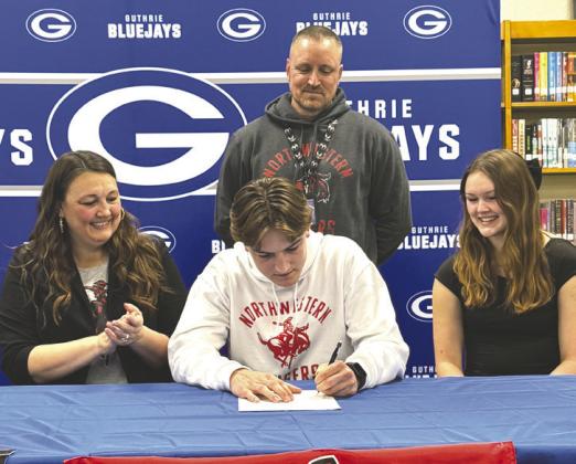 Guthrie High School senior Maddox Vaughan signs his letter of intent to play college football at Northwestern Oklahoma State University during National Signing Day. Vaughan earned all-district honors following his senior season. Photo submitted.